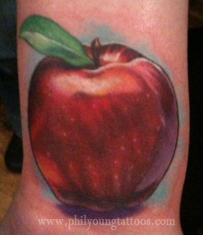 Phil Young - Apple tattoo